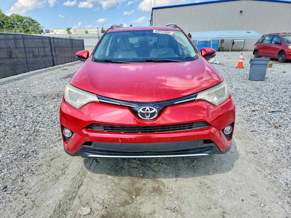 Photo 5 from auction – 2016 TOYOTA RAV4 with VIN 2T3WFREV4GW252695