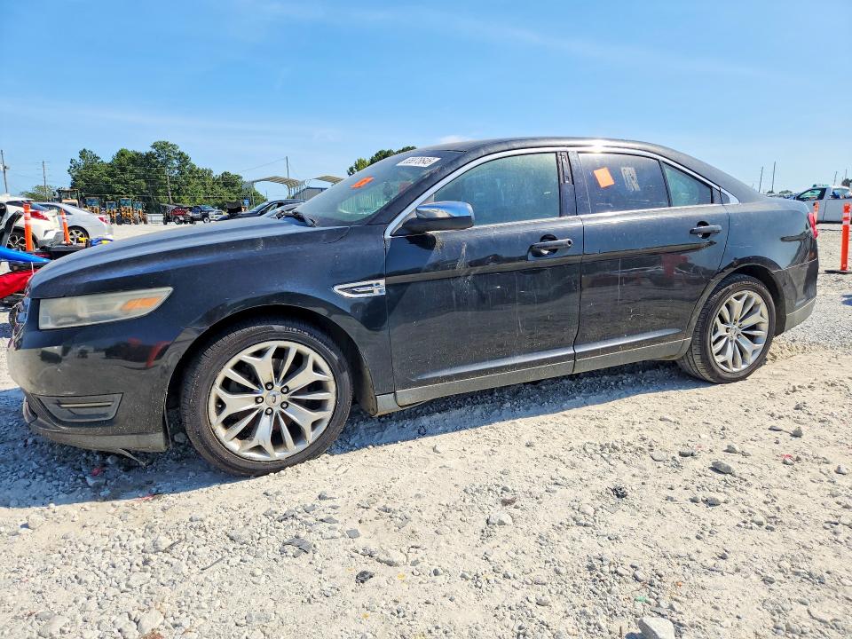 FORD TAURUS 2013 with VIN 1FAHP2F84DG103870 - Photo from auction