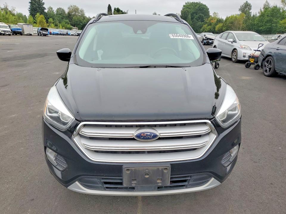 Photo 5 from auction – 2018 FORD ESCAPE with VIN 1FMCU9HD8JUA57436