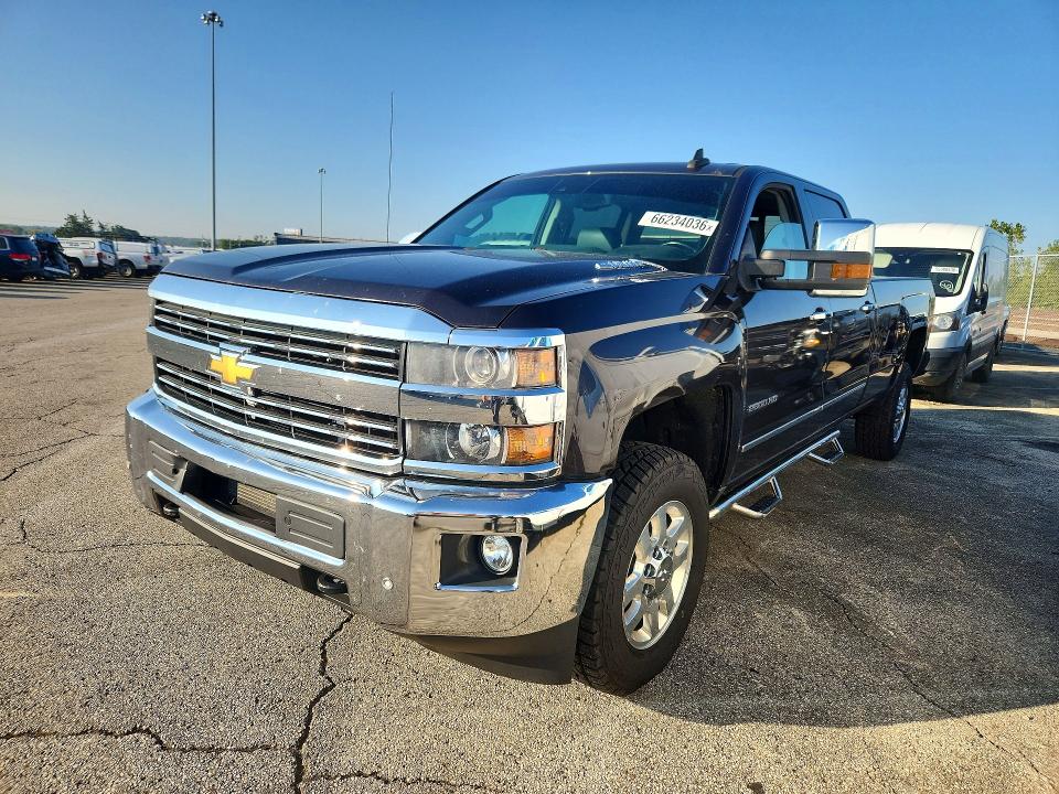 CHEVROLET SILVERADO 2015 with VIN 1GC1KWE83FF629659 - Photo from auction