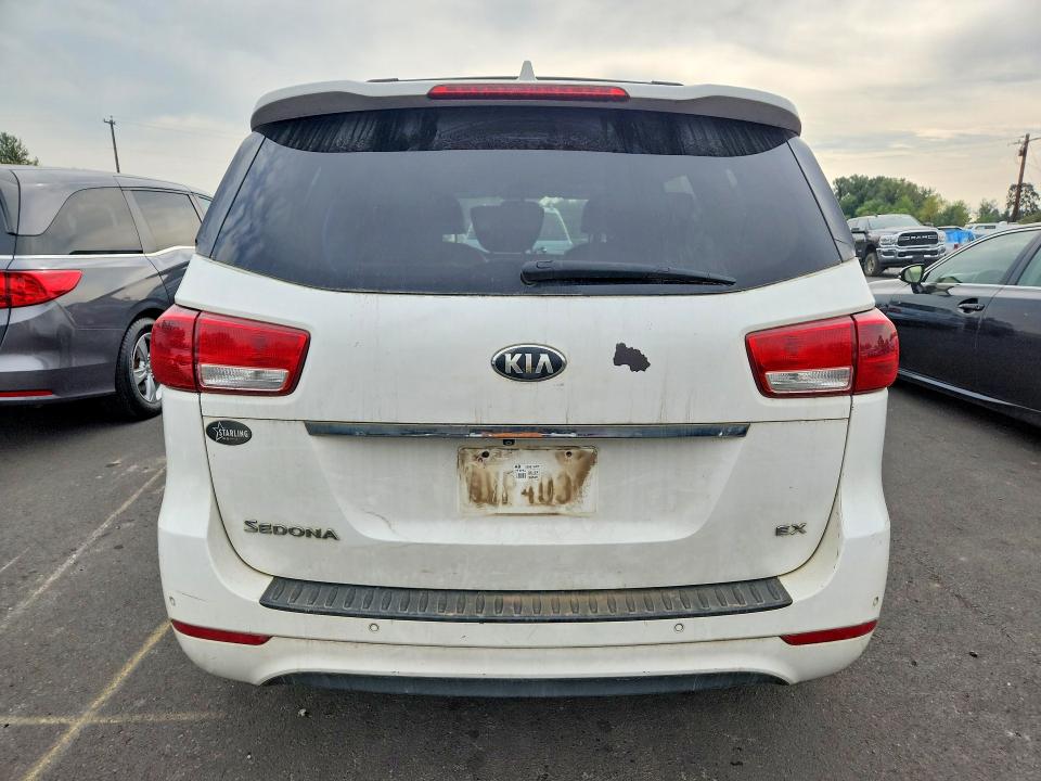 Photo 6 from auction – 2015 KIA SEDONA with VIN KNDMC5C19F6045146