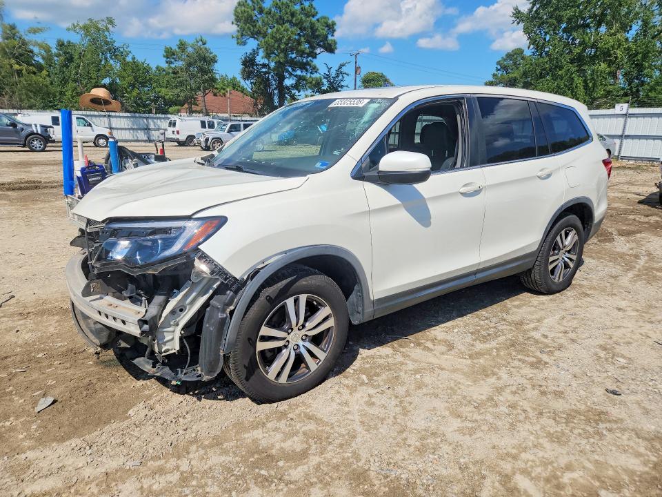 HONDA PILOT 2017 with VIN 5FNYF6H79HB059275 - Photo from auction