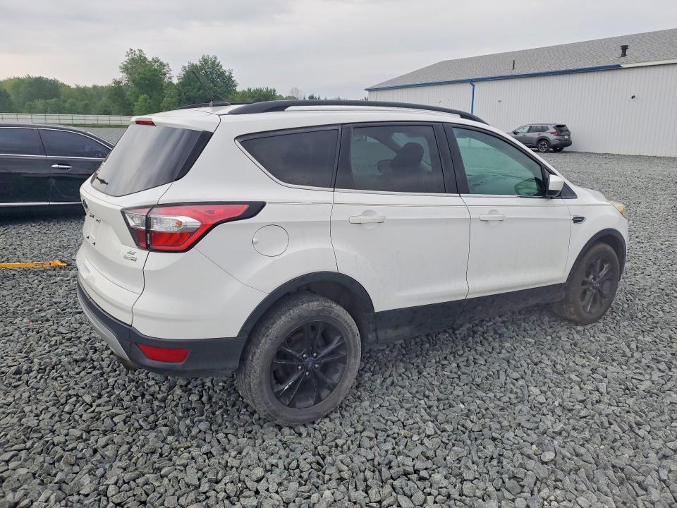 Photo 3 from auction – 2018 FORD ESCAPE with VIN 1FMCU9GD6JUA50602