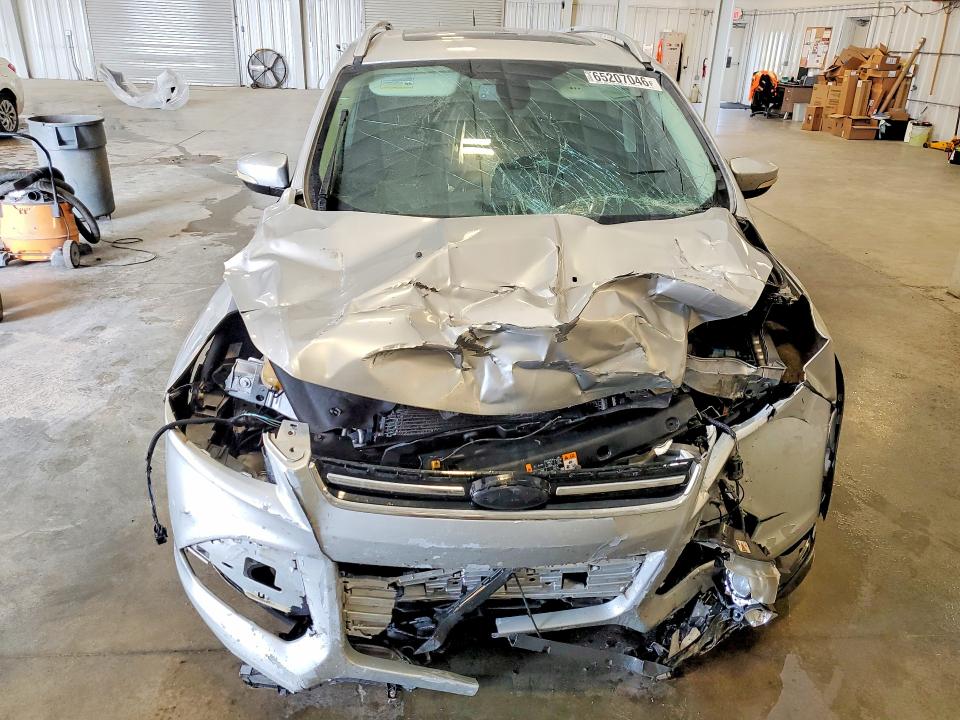 Photo 5 from auction – 2013 FORD ESCAPE with VIN 1FMCU0J96DUC55745