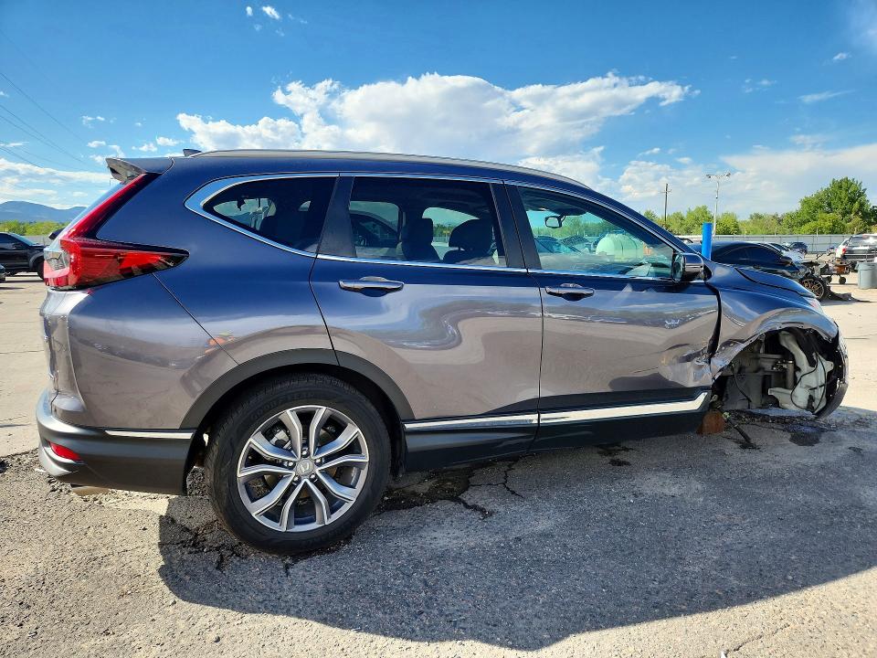 Photo 3 from auction – 2021 HONDA CR-V with VIN 2HKRW2H93MH609094