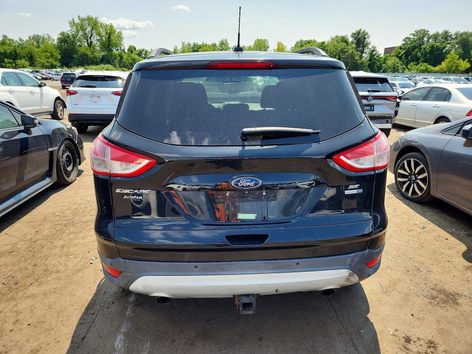 Photo 6 from auction – 2014 FORD ESCAPE with VIN 1FMCU9G95EUB11049