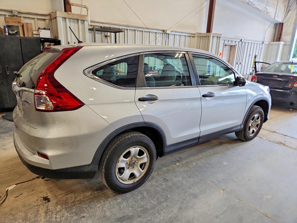 Photo 3 from auction – 2016 HONDA CRV LX with VIN 5J6RM4H34GL001527