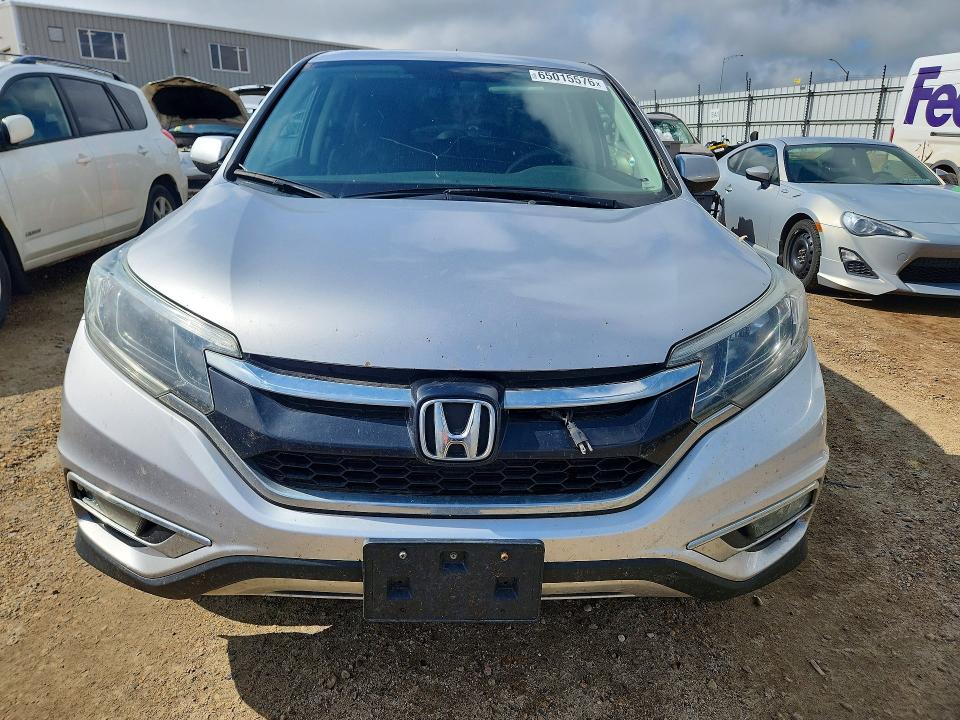 Photo 5 from auction – 2015 HONDA CR-V with VIN 2HKRM4H52FH124852