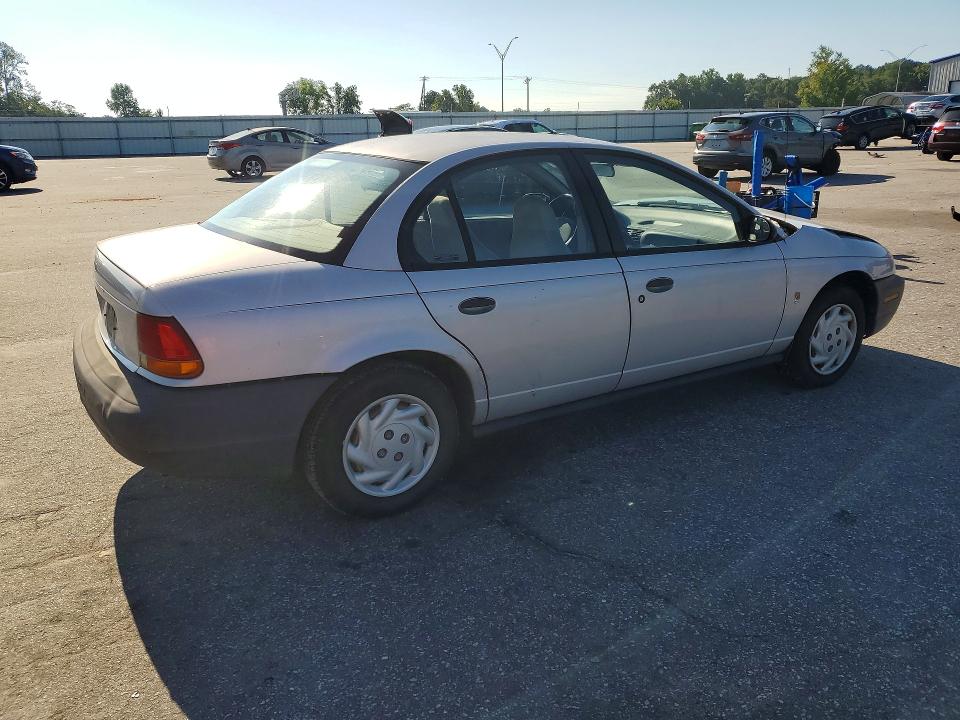 Снимка 3 от търг – 1999 SATURN SL с VIN 1G8ZF5289XZ352466