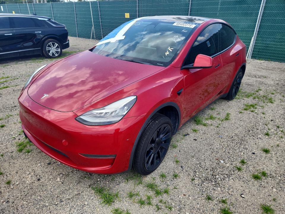 TESLA MODEL Y 2023 with VIN 7SAYGDEE5PA027281 - Photo from auction
