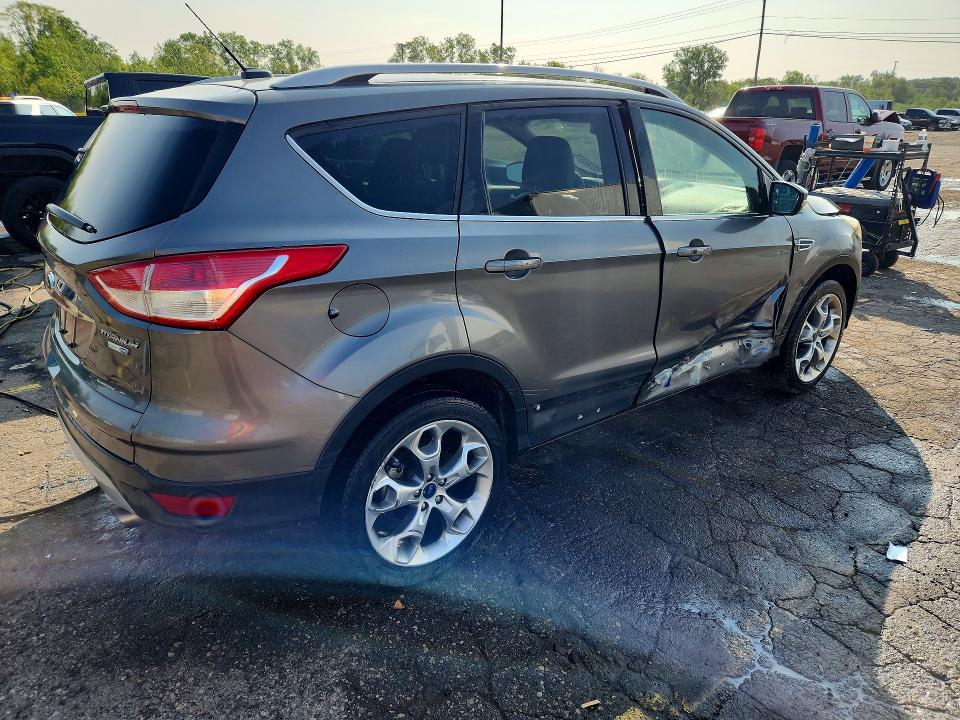Photo 3 from auction – 2014 FORD ESCAPE with VIN 1FMCU9J9XEUE38197