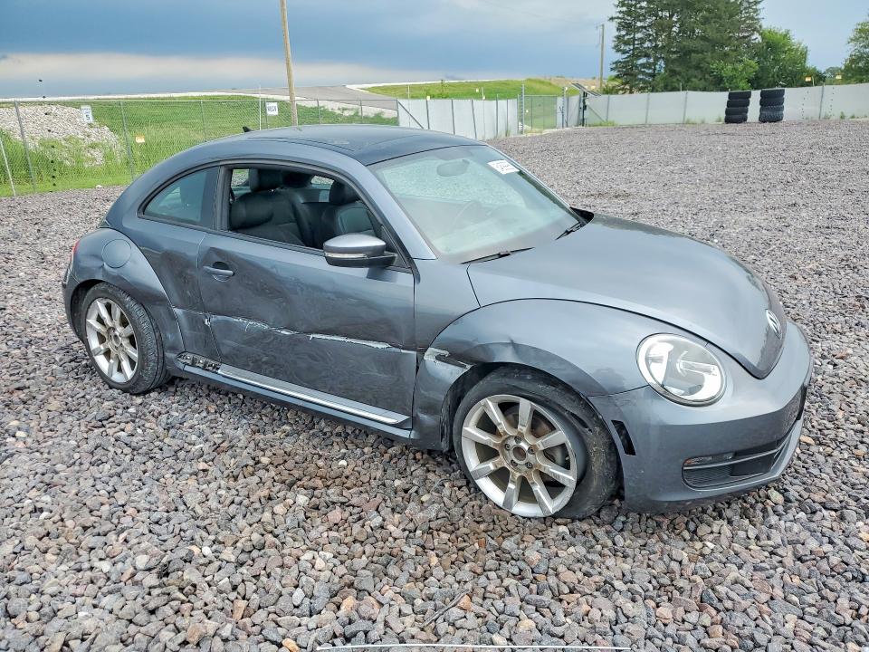 Photo 4 from auction – 2014 VOLKSWAGEN BEETLE with VIN 3VWJP7AT6EM611508
