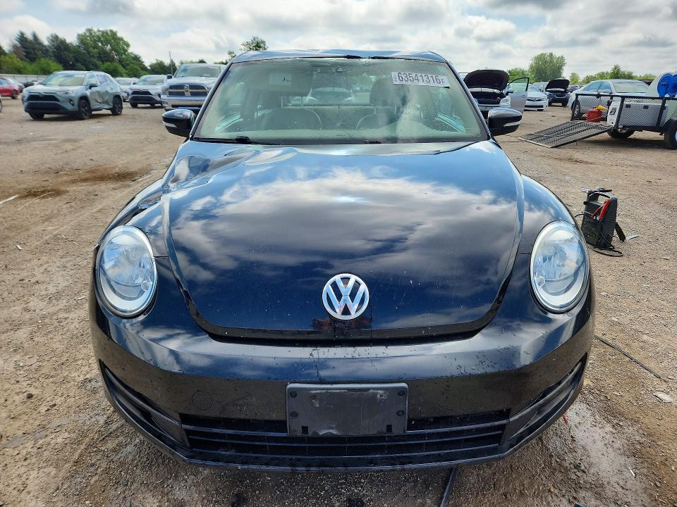 Photo 5 from auction – 2012 VOLKSWAGEN BEETLE with VIN 3VWJP7AT6CM661497