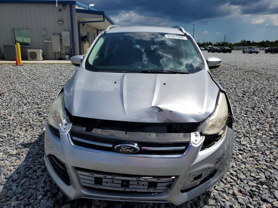 Photo 5 from auction – 2016 FORD ESCAPE with VIN 1FMCU0J92GUA77336