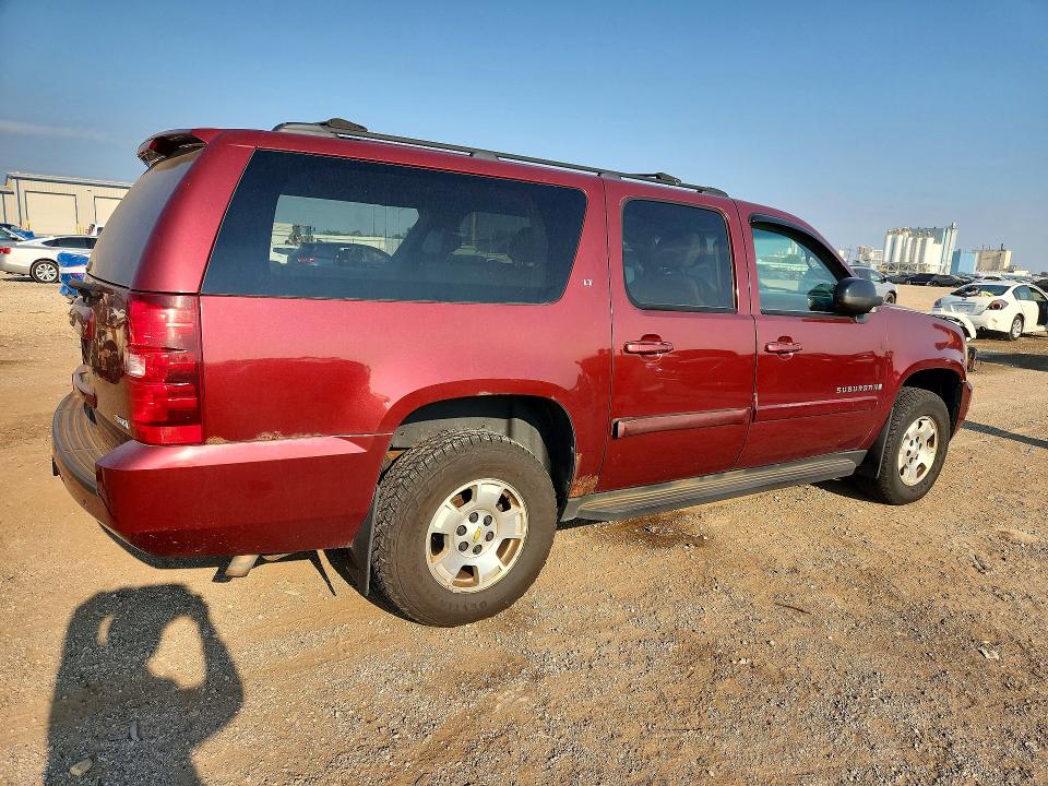 Photo 3 from auction – 2009 CHEVROLET SUBURBAN with VIN 1GNFK26359J121770