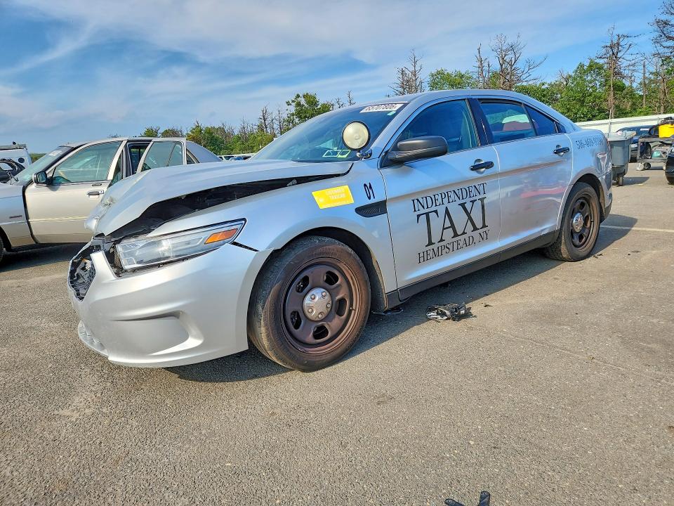 FORD TAURUS 2014 with VIN 1FAHP2MK0EG185581 - Photo from auction
