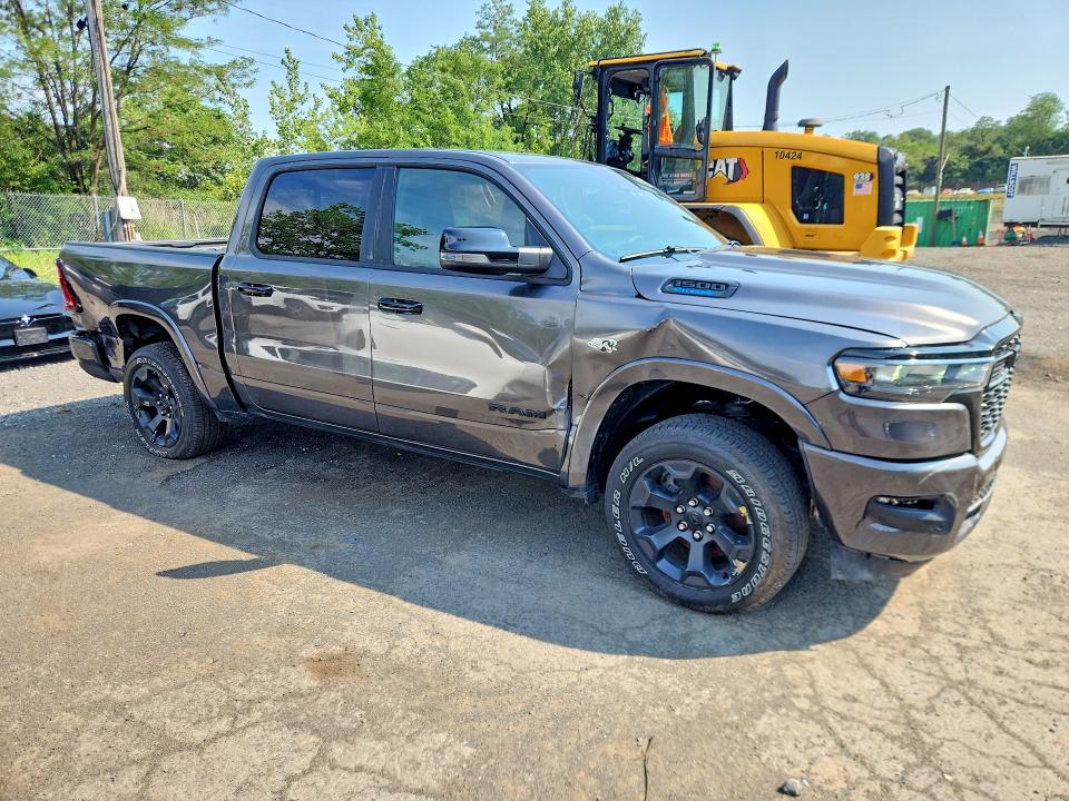 Photo 4 from auction – 2026 RAM 1500 with VIN 1C6SRFFT8TN212937