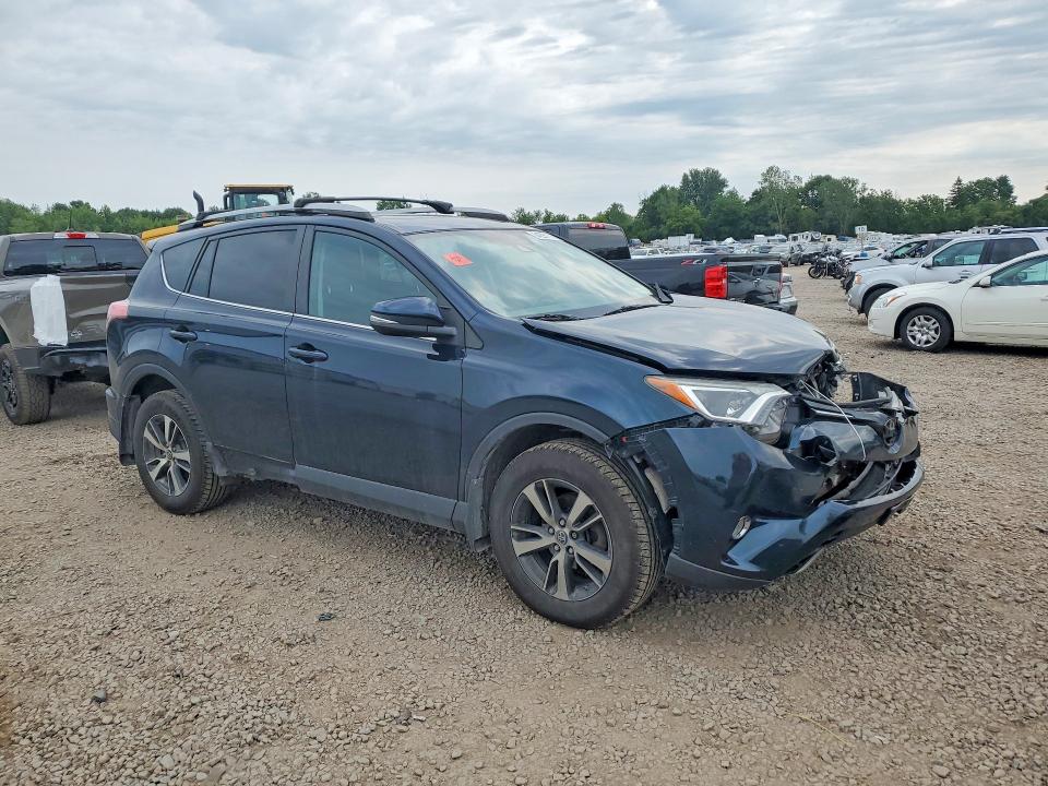 Photo 4 from auction – 2018 TOYOTA RAV4 with VIN 2T3RFREV3JW741089