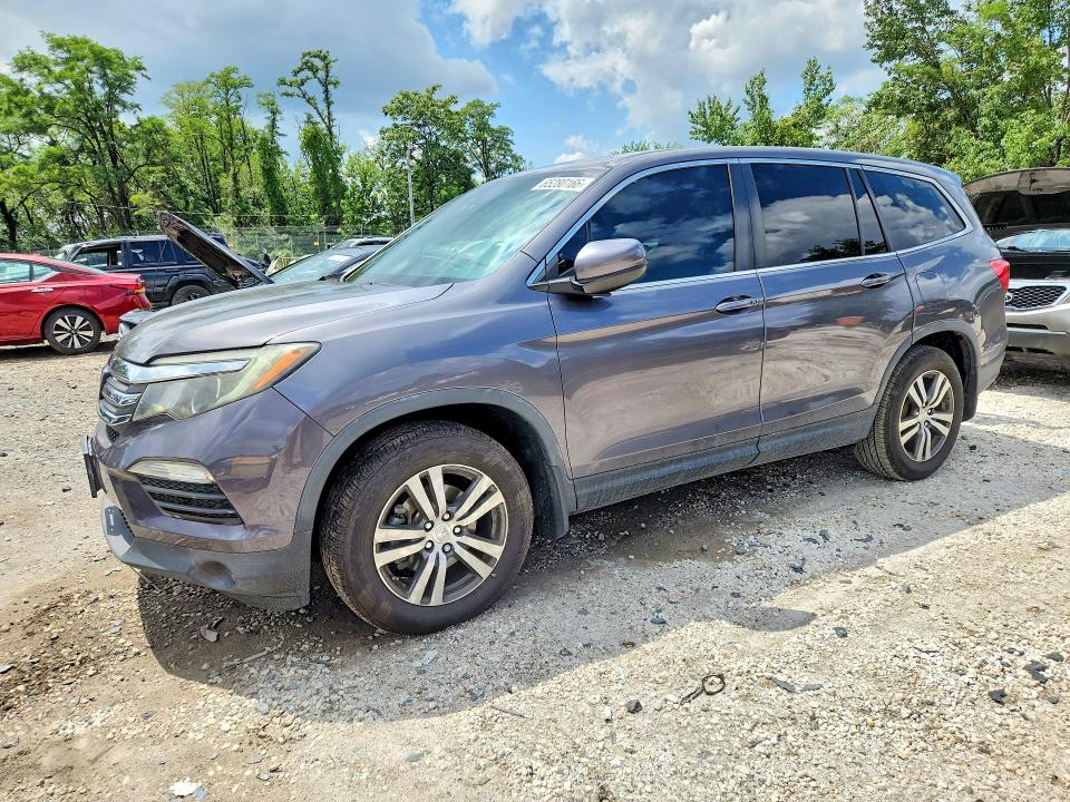 HONDA PILOT 2018 with VIN 5FNYF6H64JB060010 - Photo from auction