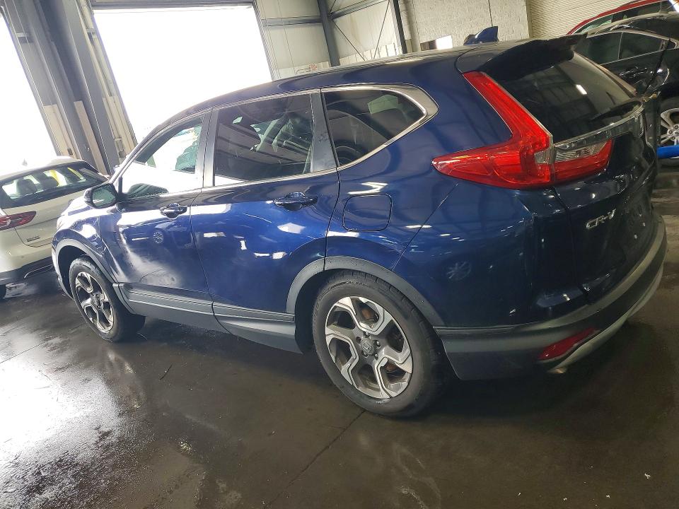 Photo 2 from auction – 2019 HONDA CR-V with VIN 7FARW2H86KE005496