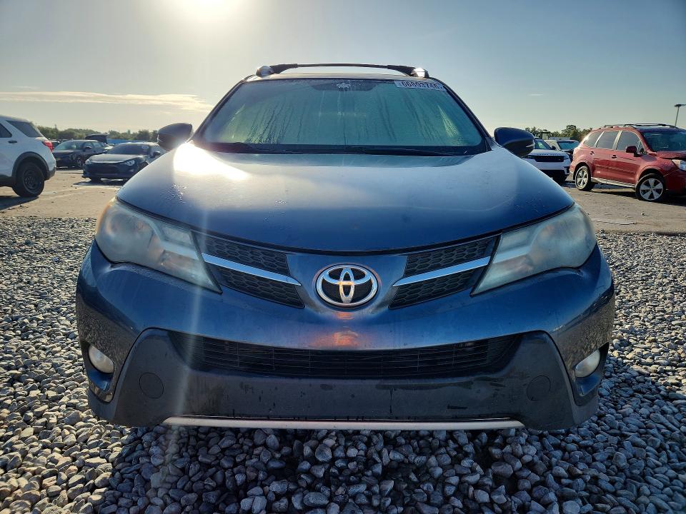 Photo 5 from auction – 2013 TOYOTA RAV4 with VIN JTMRFREV2DD045129