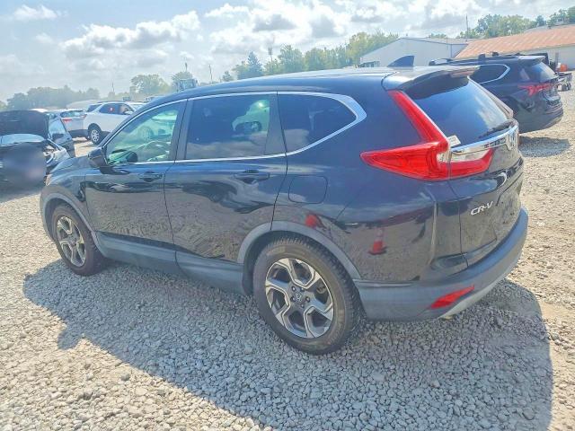 Photo 2 from auction – 2017 HONDA CR-V with VIN 7FARW1H83HE000145