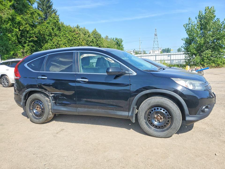 Photo 4 from auction – 2014 HONDA CR-V with VIN 2HKRM4H94EH131478