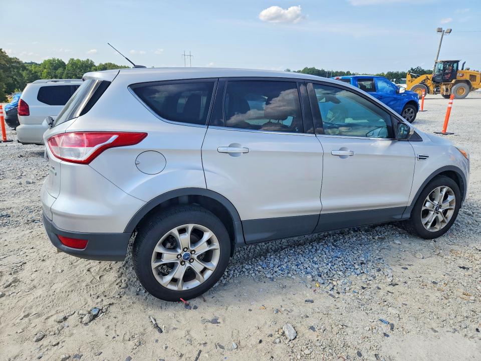 Photo 3 from auction – 2013 FORD ESCAPE with VIN 1FMCU0H99DUC79771