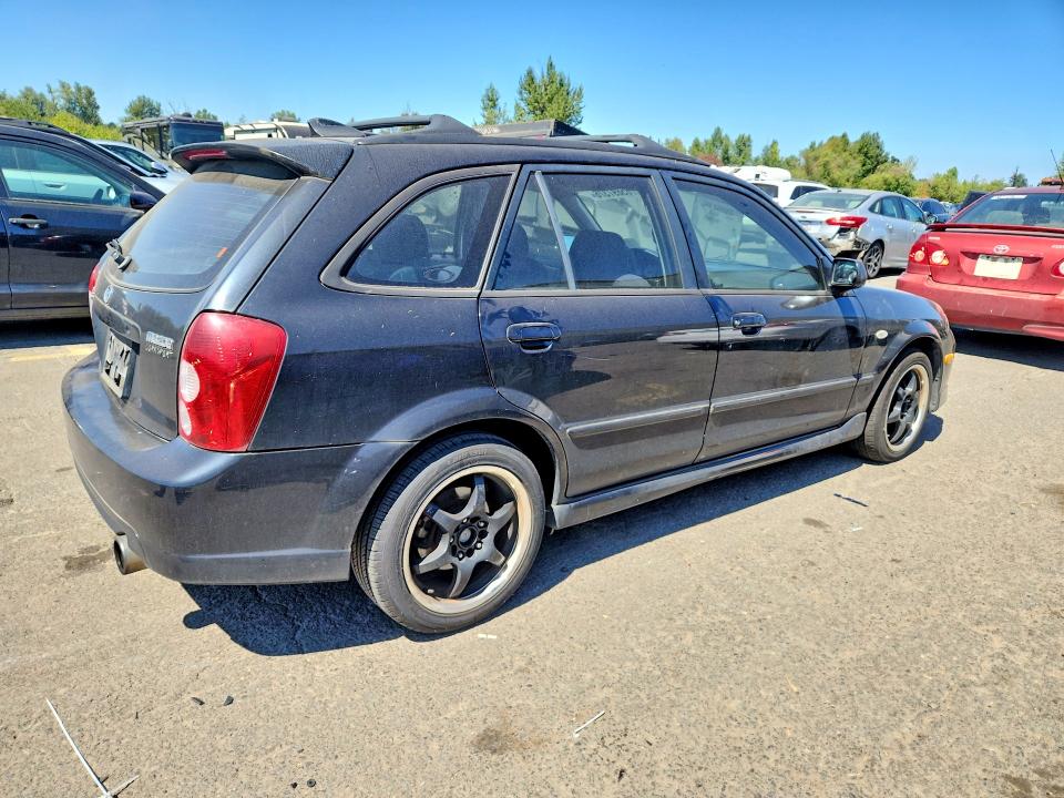 Photo 3 from auction – 2002 MAZDA PROTEGE with VIN JM1BJ246321605899