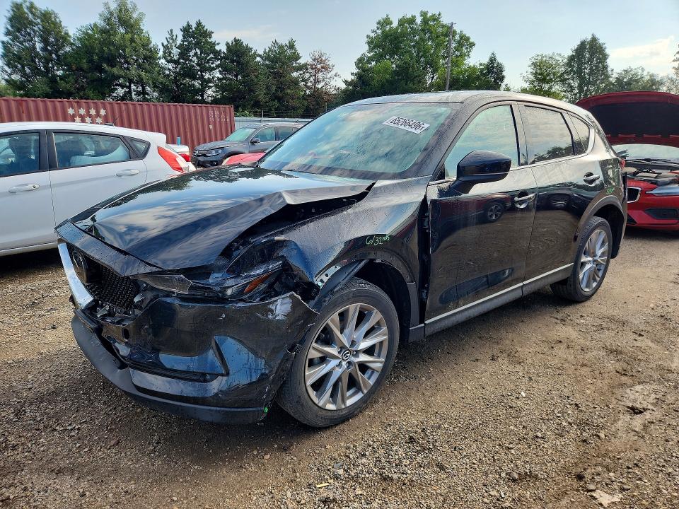 MAZDA CX-5 2021 with VIN JM3KFBDMXM0384169 - Photo from auction
