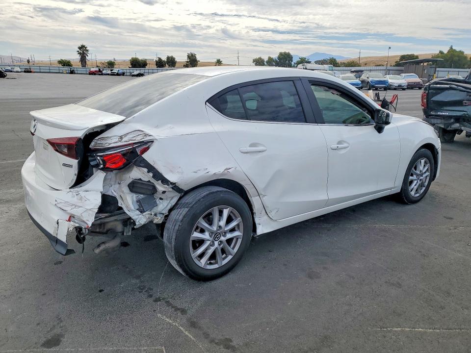 Photo 3 from auction – 2015 MAZDA 3 with VIN 3MZBM1V77FM232087