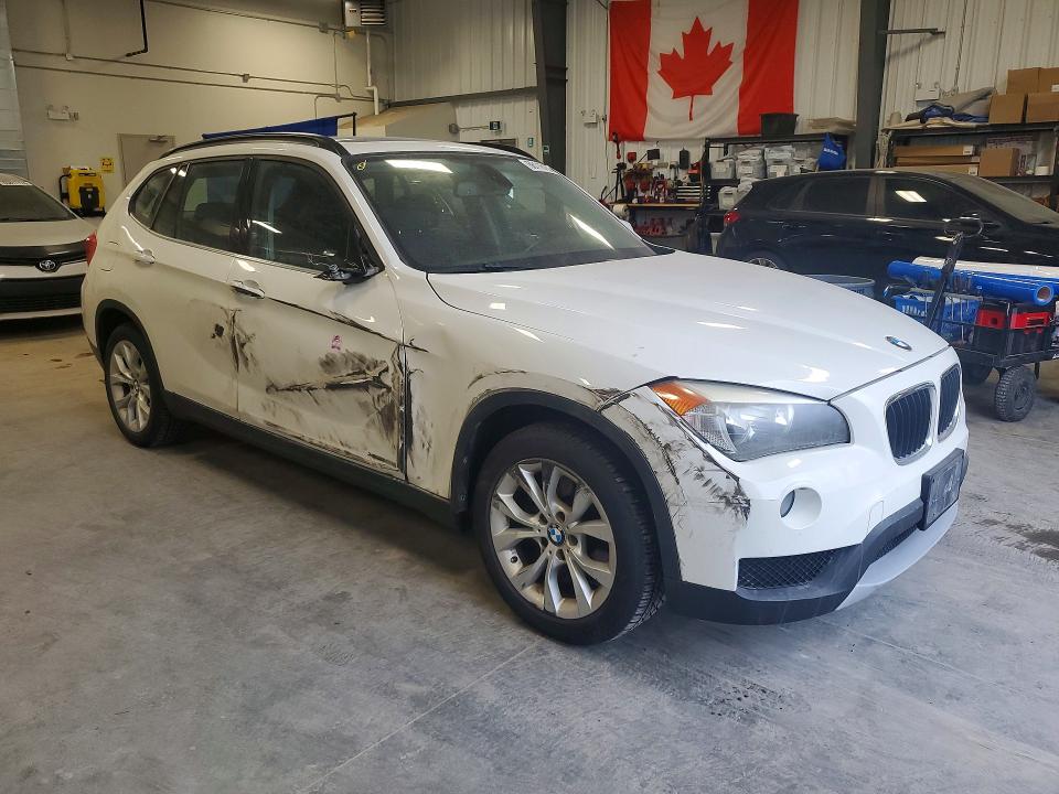 Photo 4 from auction – 2013 BMW X1 with VIN WBAVL1C52DVR91539
