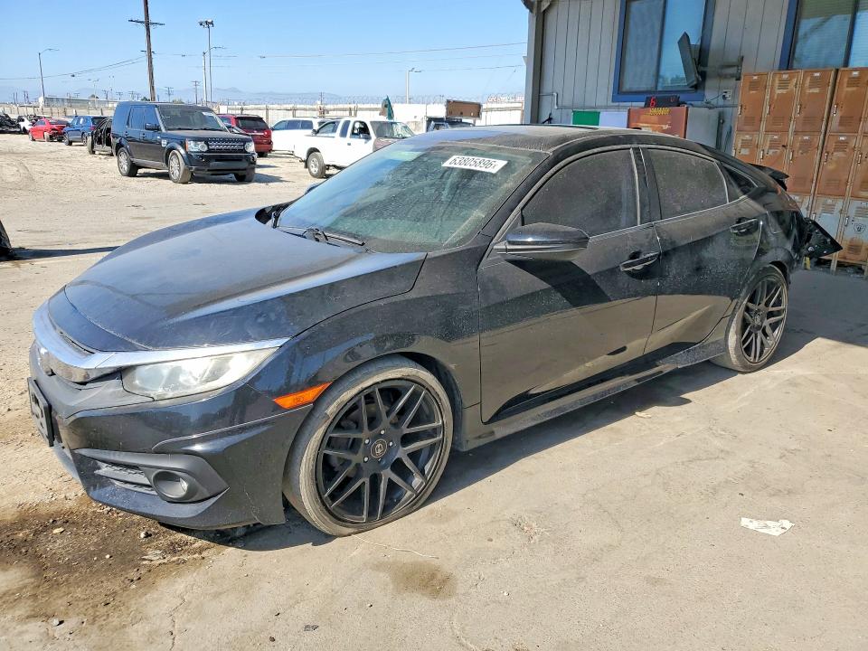 HONDA CIVIC 2016 with VIN 2HGFC1F72GH636891 - Photo from auction