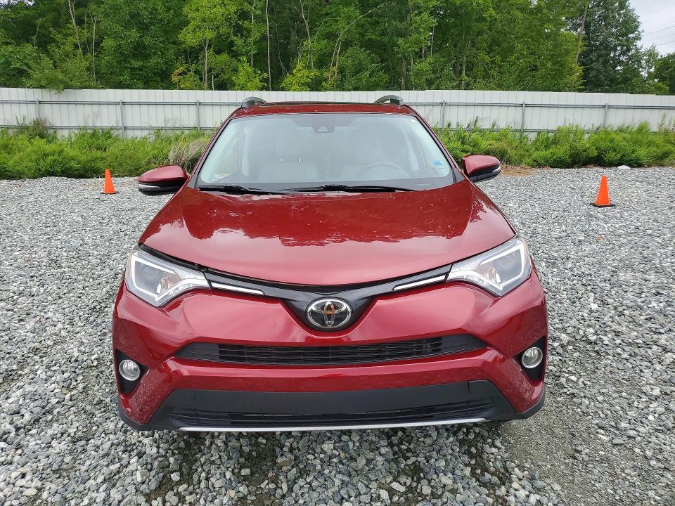 Photo 5 from auction – 2018 TOYOTA RAV4 with VIN 2T3WFREV1JW453915