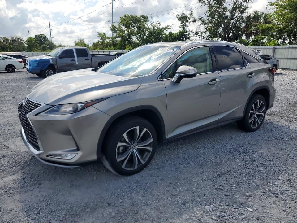 LEXUS RX 2022 with VIN 2T2HZMAA7NC253171 - Photo from auction