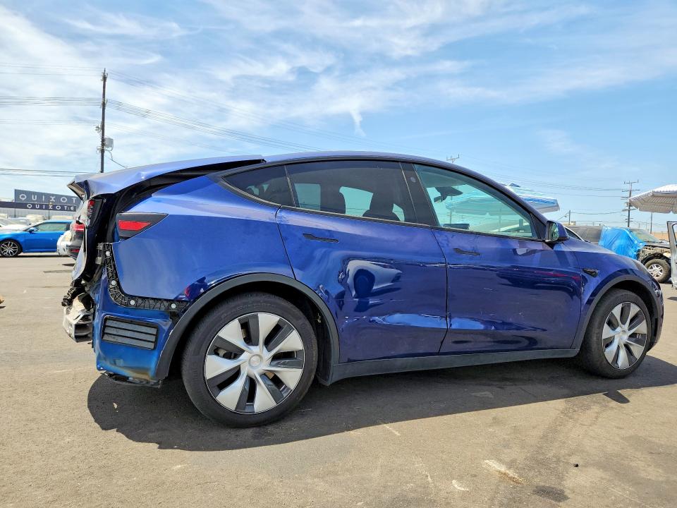 Photo 3 from auction – 2023 TESLA MODEL Y with VIN 7SAYGDED7PF964885