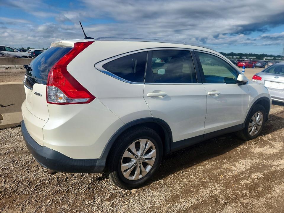 Photo 3 from auction – 2014 HONDA CR-V with VIN 5J6RM4H74EL107881