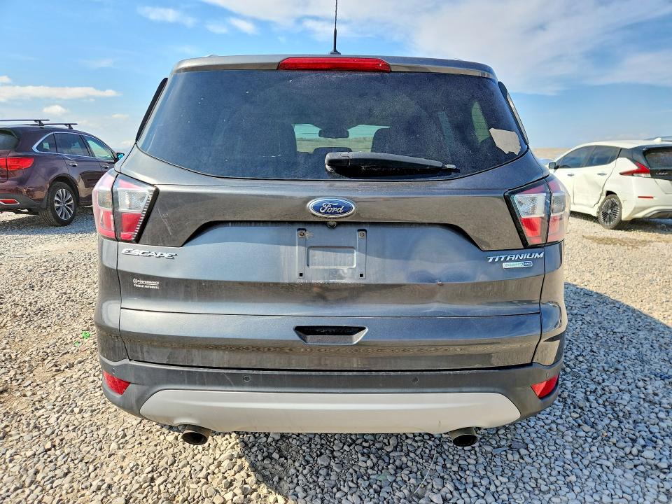 Photo 6 from auction – 2017 FORD ESCAPE with VIN 1FMCU9J95HUC28868