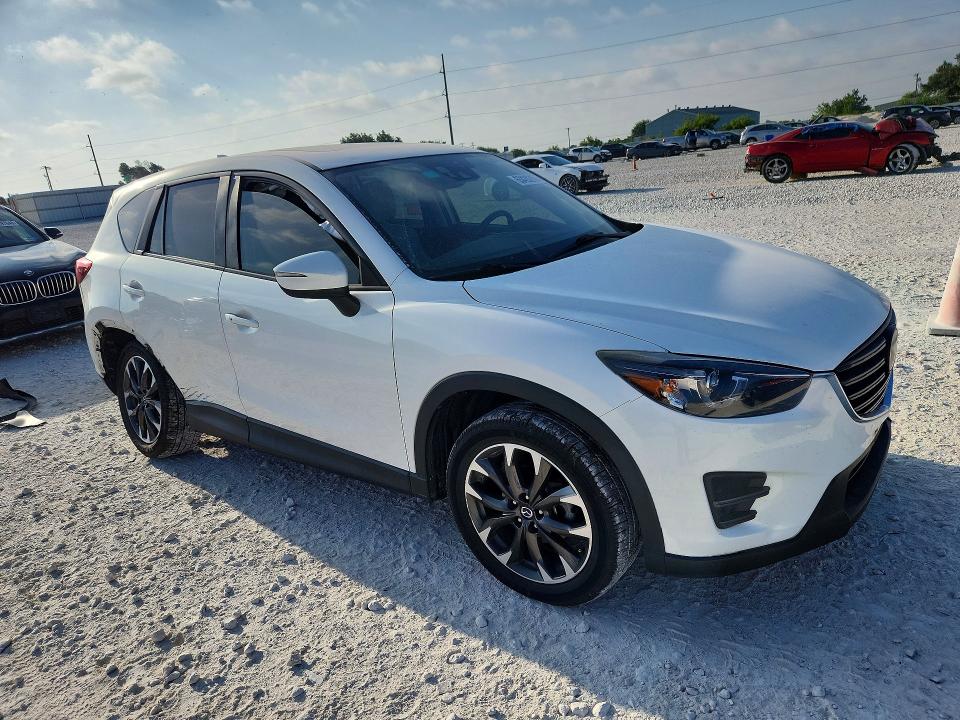 Photo 4 from auction – 2016 MAZDA CX-5 with VIN JM3KE2DY5G0910914