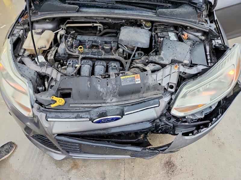 Photo 11 from auction – 2013 FORD FOCUS with VIN 1FADP3F20DL368843