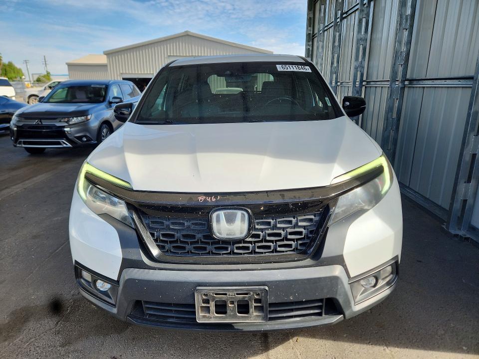 Photo 5 from auction – 2020 HONDA PASSPORT with VIN 5FNYF7H54LB006433