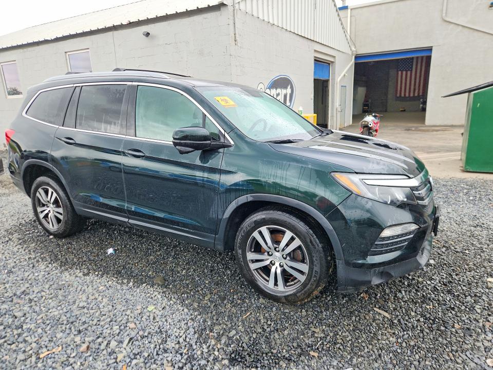 Фото 4 с аукциона – 2016 HONDA PILOT с VIN 5FNYF6H57GB127618