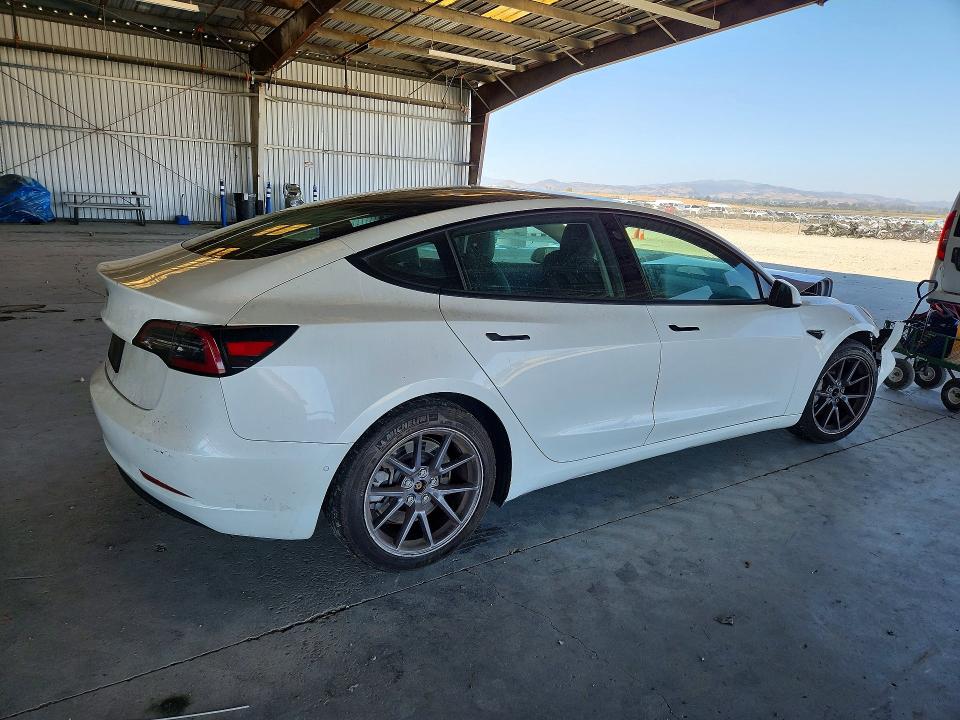 Photo 3 from auction – 2021 TESLA MODEL 3 with VIN 5YJ3E1EA7MF942821