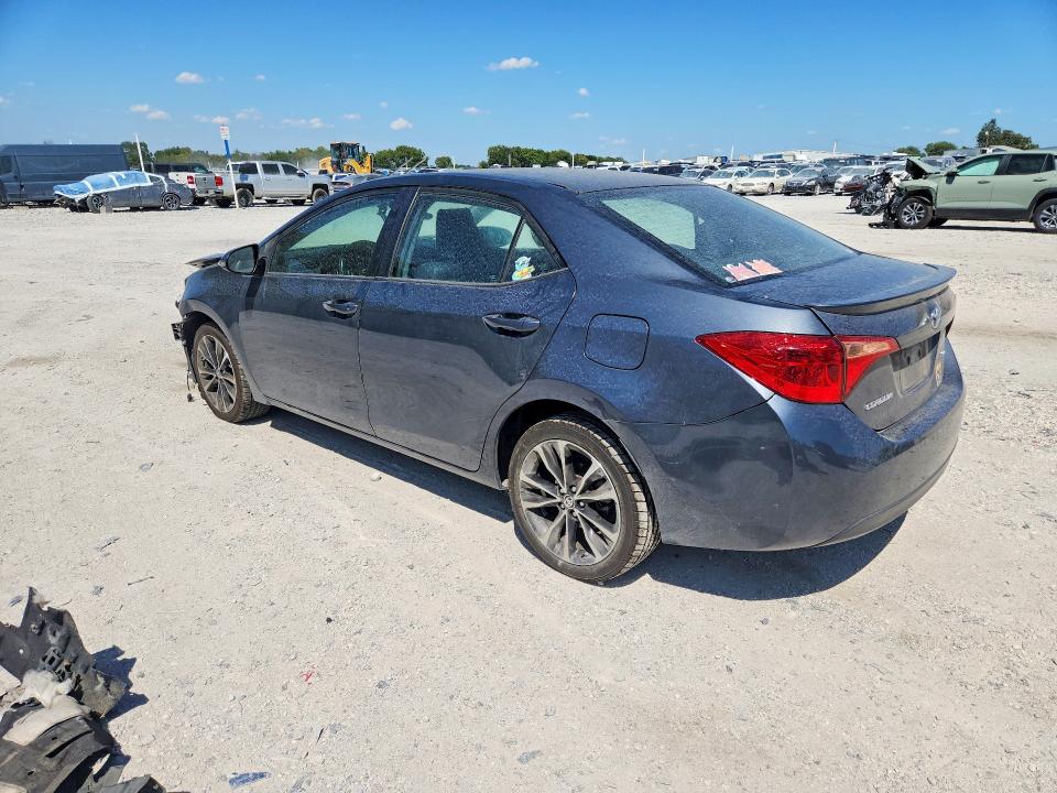 Photo 2 from auction – 2018 TOYOTA COROLLA with VIN 5YFBURHE8JP801011