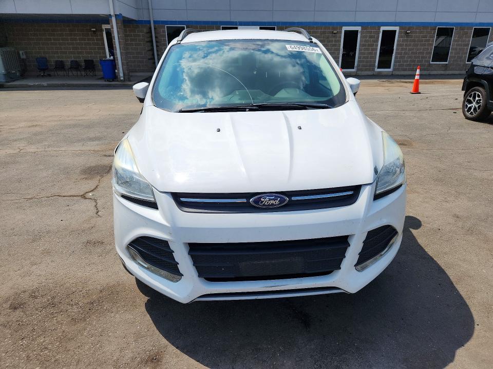 Photo 5 from auction – 2016 FORD ESCAPE with VIN 1FMCU9GX1GUB02110