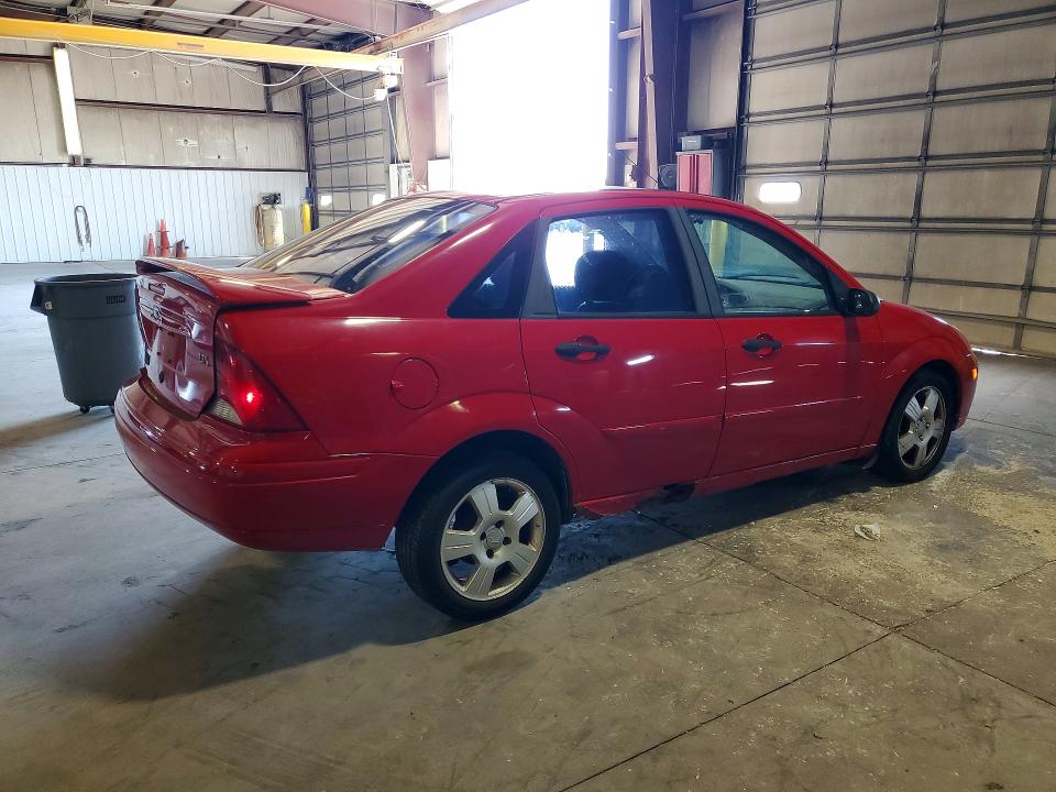 Снимка 3 от търг – 2003 FORD FOCUS с VIN 1FAFP38373W337441
