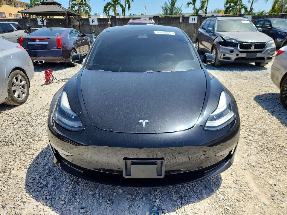 Photo 5 from auction – 2021 TESLA MODEL 3 with VIN 5YJ3E1EA4MF058450