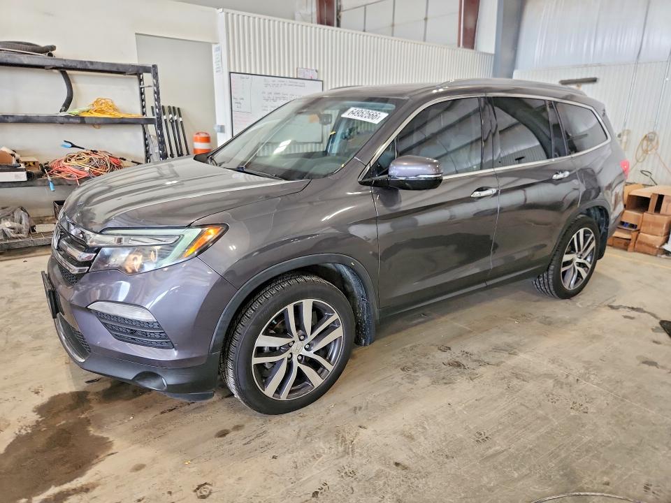 HONDA PILOT 2017 с VIN 5FNYF5H91HB046449 - Снимка от търг