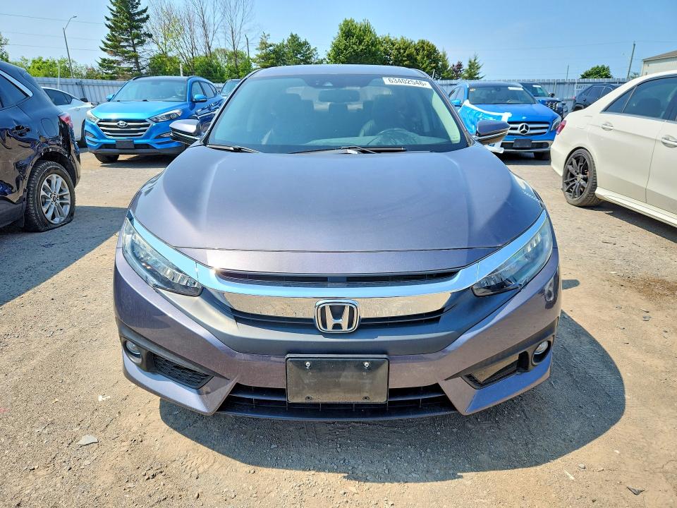 Photo 5 from auction – 2017 HONDA CIVIC with VIN 2HGFC1F95HH100570