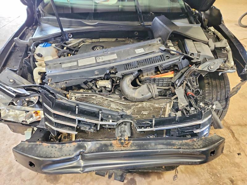Photo 11 from auction – 2014 VOLKSWAGEN PASSAT with VIN 1VWCT7A3XEC042457